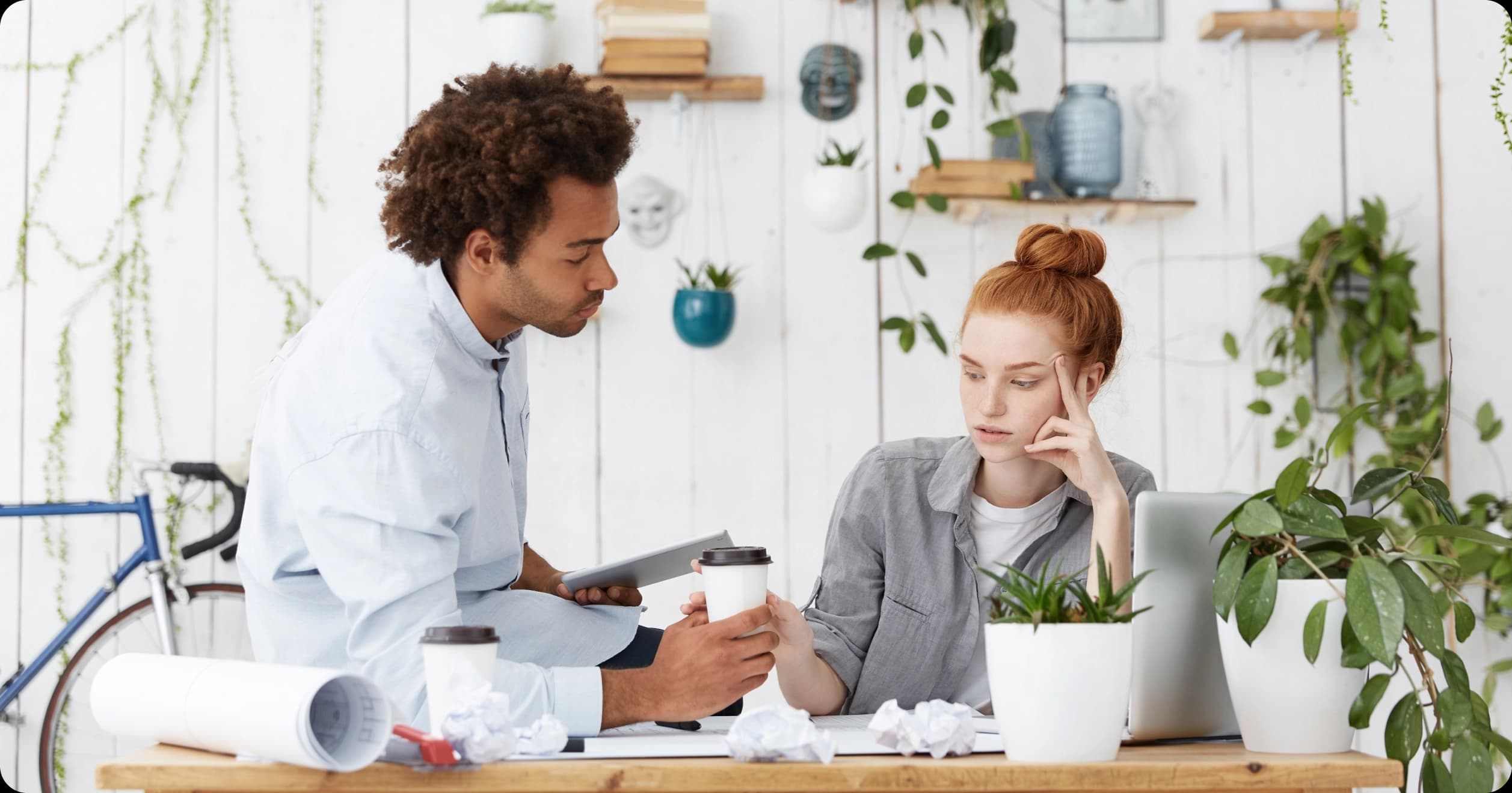 Coworker offering support to a stressed colleague during a workplace conversation