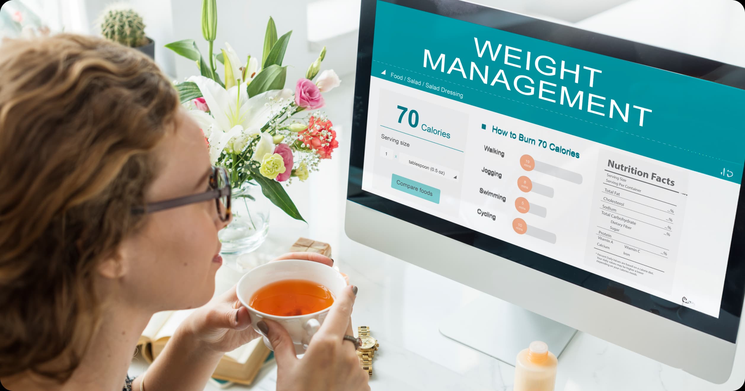 Woman reviewing a weight management dashboard showing calorie information and exercise equivalents—representing chronic disease in the workplace.
